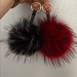 Two Pom Pom purse charms keychains